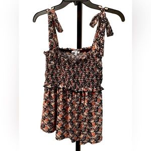 White Birch babydoll tank with adjustable bow ties in flower pattern